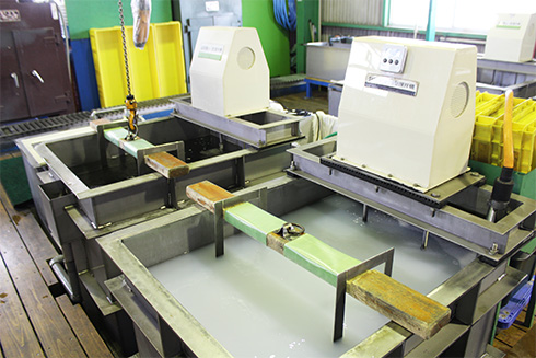 金属部品洗浄(超振動式洗浄システム)